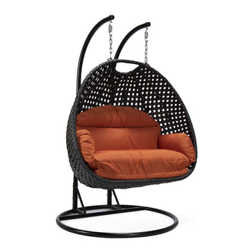 LeisureMod MendozaWicker Hanging 2 person Egg Swing Chair in Orange - Ethereal Company